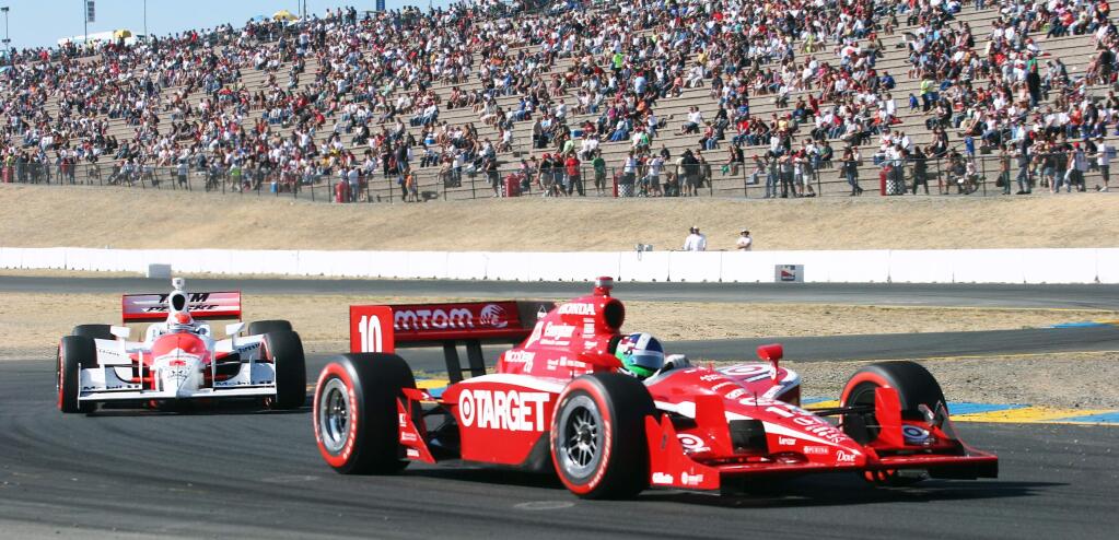 Dario Franchitti (#10),leading from start to finish over second-place finisher Ryan Briscoe (#6), captured the IndyCar Grand Prix of Sonoma Sunday, August 23 at Infineon Raceway and celebrated with a glass of cabernet on the winner's podium.