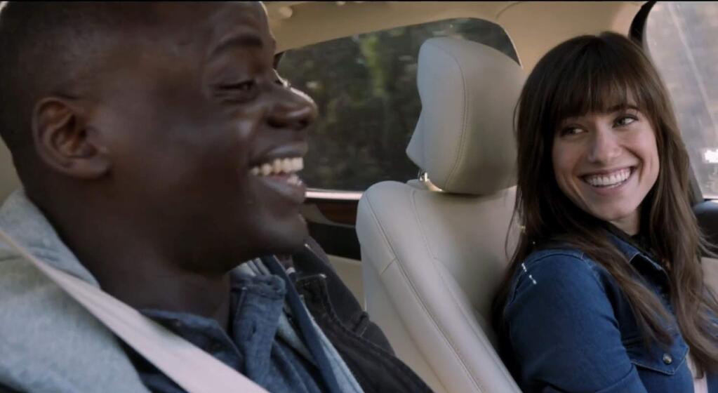 Daniel Kaluuya and Allison Williams as a couple going to meet her rich parents in the satirical horror film 'Get Out,' directed by Jordan Peele. (Universal Pictures)