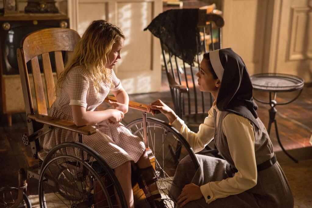 Talitha Bateman as Janice and Stephanie Sigman as Sister Charlotte star in the horror film 'Annabelle: Creation.' (NEW LINE CINEMA)
