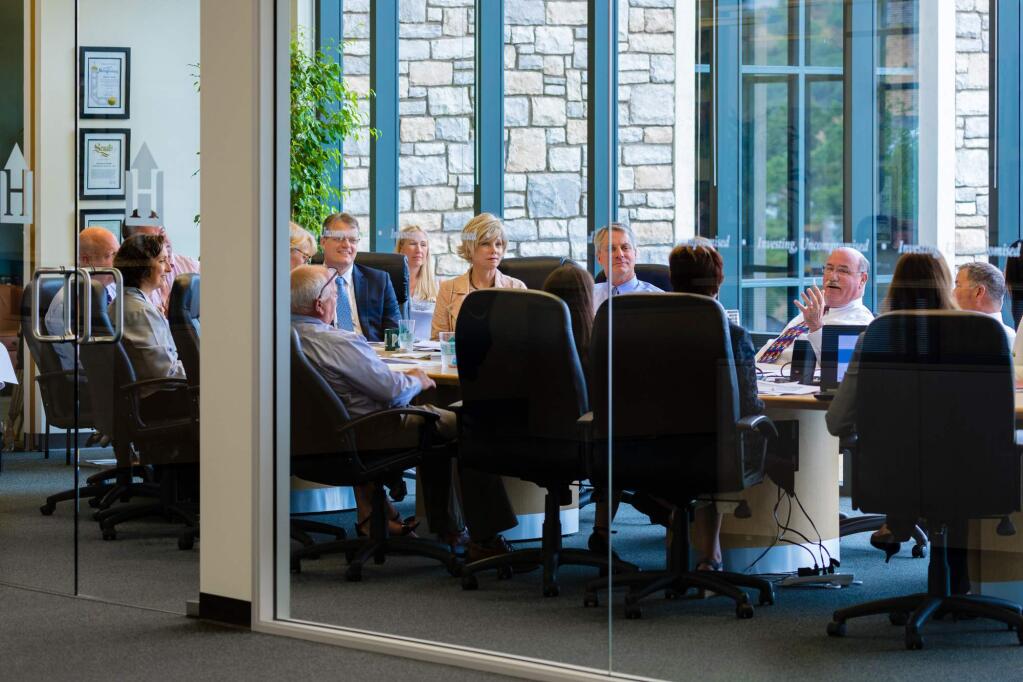 A staff meeting at Hennessy Advisors’ Novato offices. (courtesy of Hennessy Advisors)
