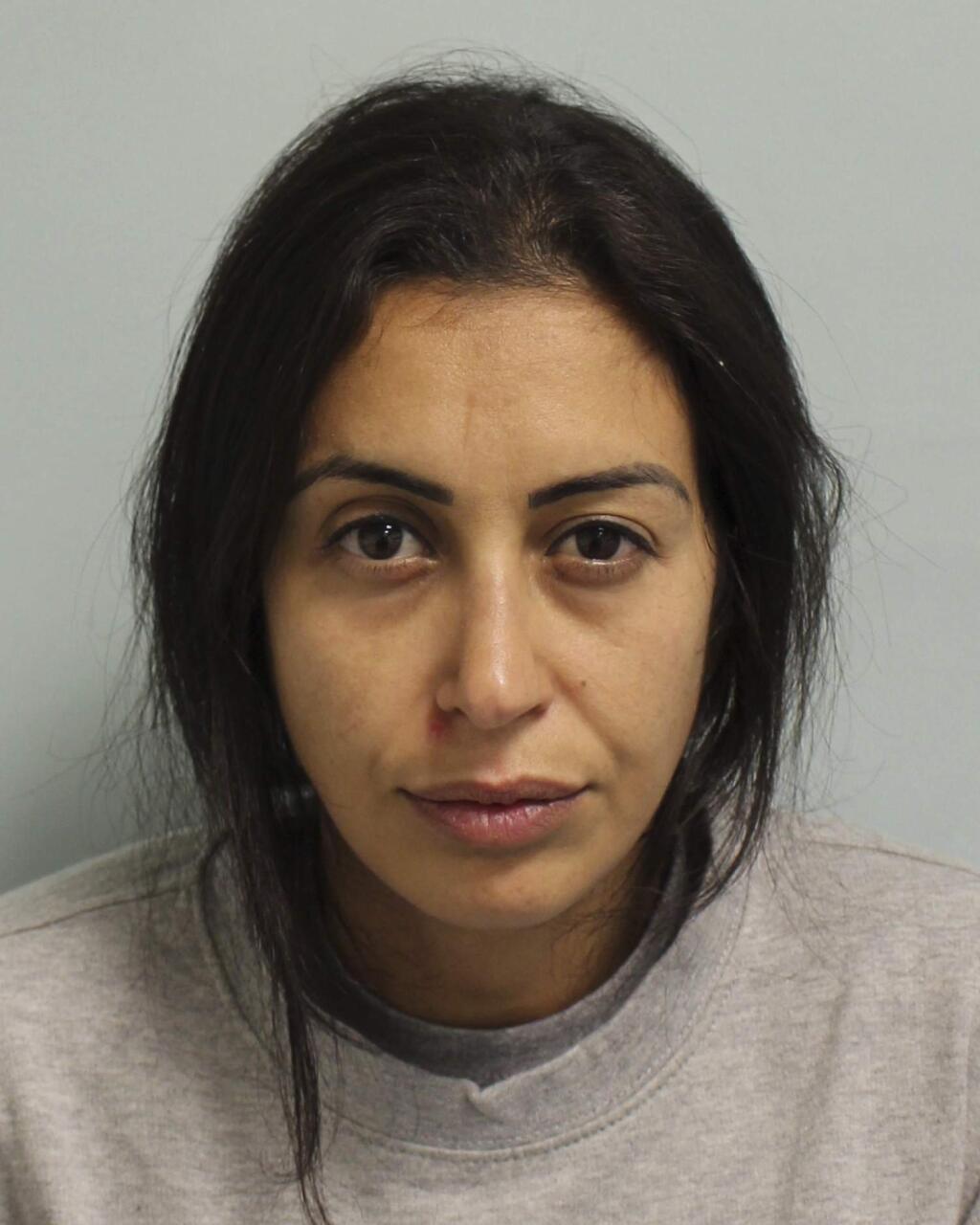 This undated Metropolitan Police photo shows Sabrina Kouider. A jury at London's Central Criminal Court convicted 40-year-old Ouissem Medouni and 35-year-old Sabrina Kouider on Thursday May 24, 2018 after six days of deliberation. The couple were found guilty of murdering their French nanny and burning her body on a bonfire in their London backyard. (Metropolitan Police via AP)