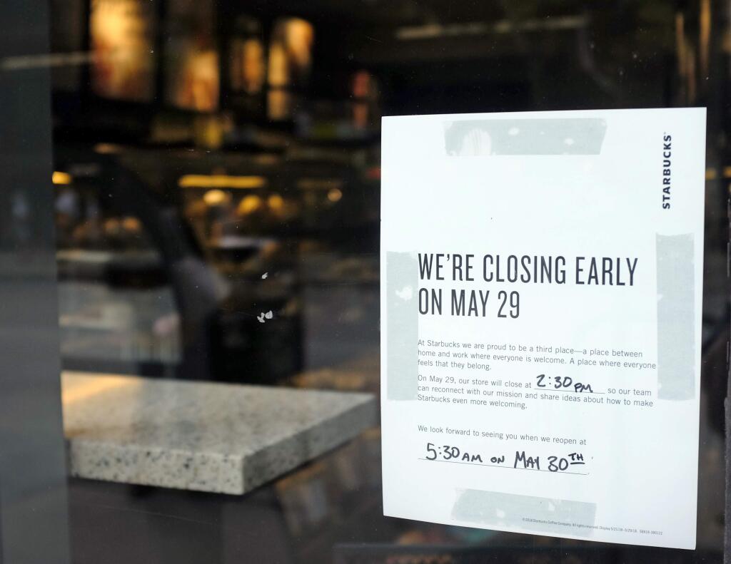 A store closing sign for May 25 is posted outside of a Starbucks store, Friday, May 25, 2018, in Chicago. Starbucks will close more than 8,000 stores nationwide on Tuesday to conduct anti-bias training, the next of many steps the company is taking to try to restore its tarnished diversity-friendly image. (AP Photo/Kiichiro Sato)