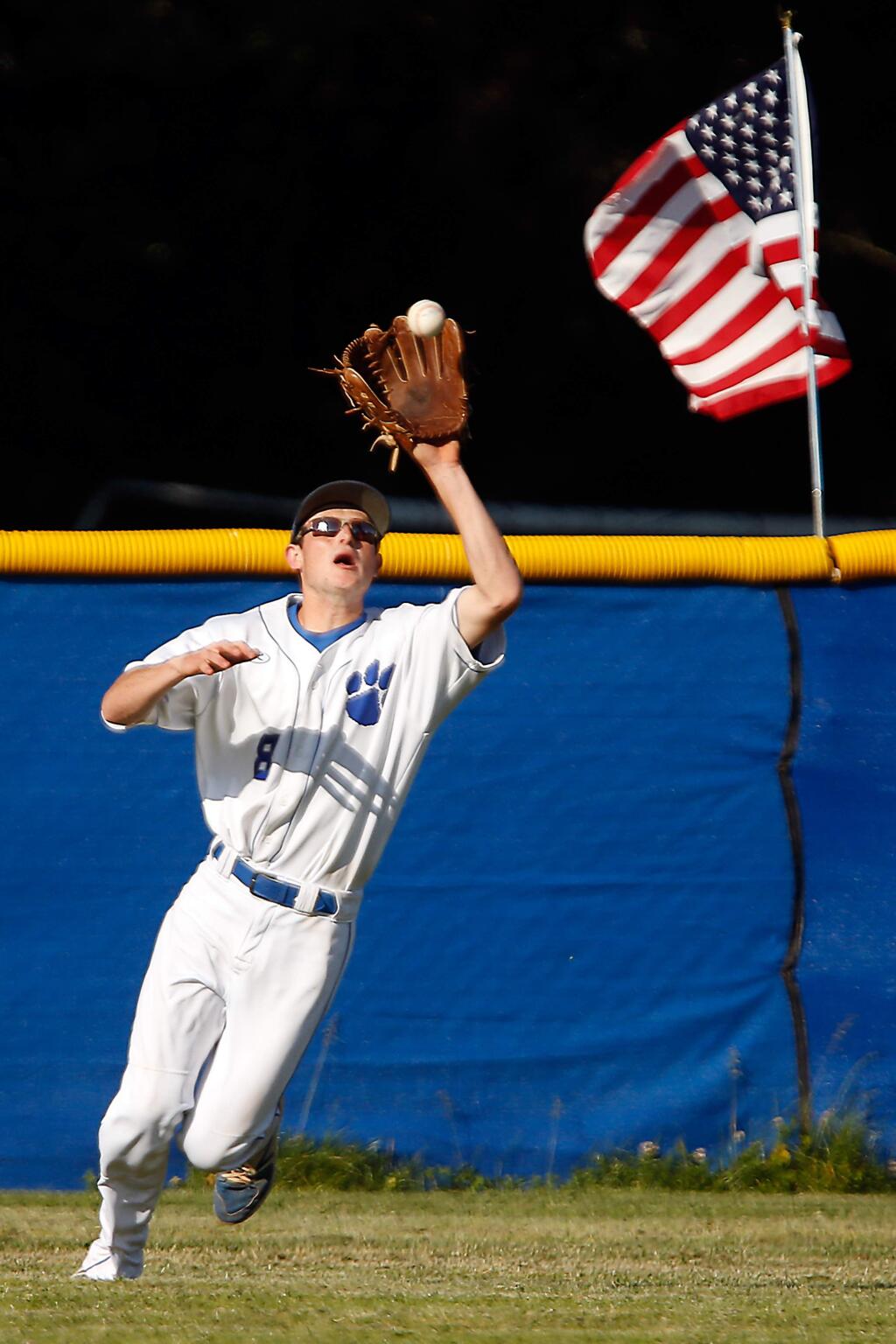 Analy centerfielder Luke Tollini (8) catches a fly ball in the third inning of the NCS playoff baseball game between Analy and San Marin high schools, in Sebastopol, California, on Tuesday, May 22, 2018. (Alvin Jornada / The Press Democrat)