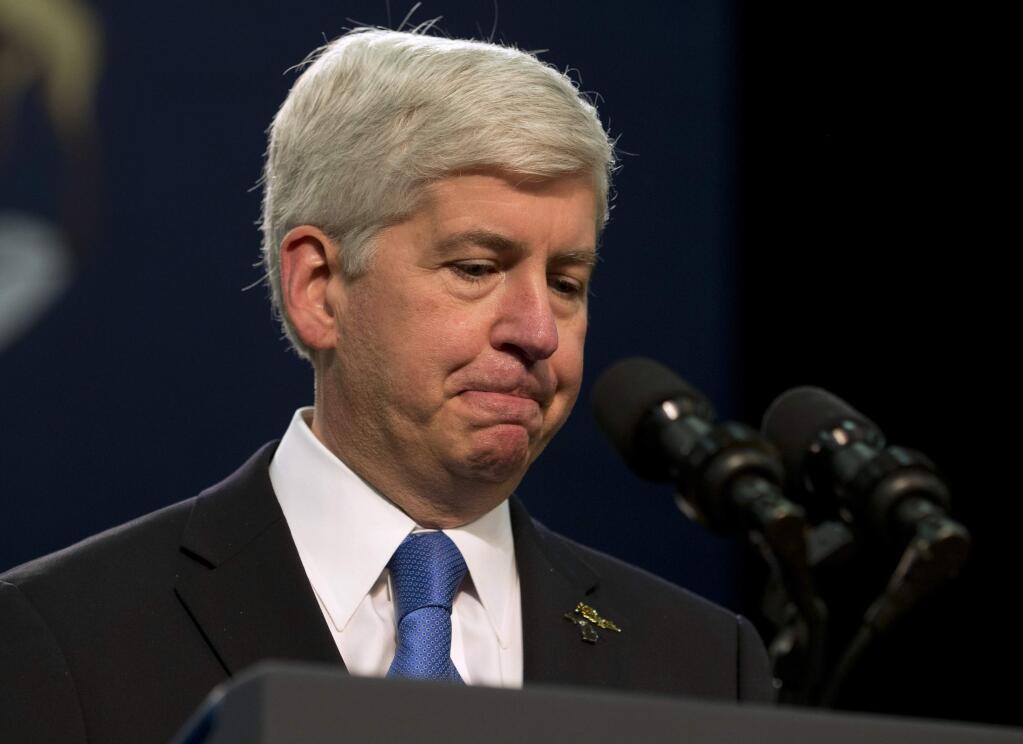 Michigan Gov. Rick Snyder pauses as he speaks at Flint Northwestern High School in Flint, Mich., Wednesday, May 4, 2016. Snyder apologized. President Barack Obama is in Flint, Mich., to talk about the ongoing water crisis. (AP Photo/Carolyn Kaster)