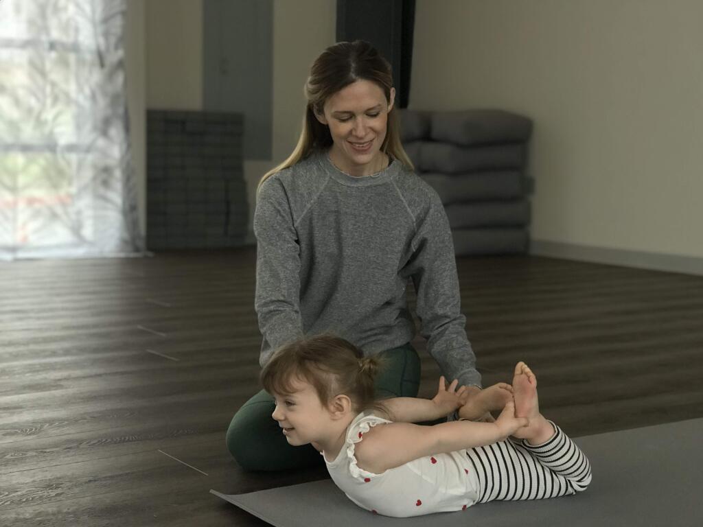 Yoga enthusiast and young mom Lia Mariani with her 2.5-year-old daughter Una at Noble Yoga on Highway 12 on Friday, March 22. Photo: Lorna Sheridan