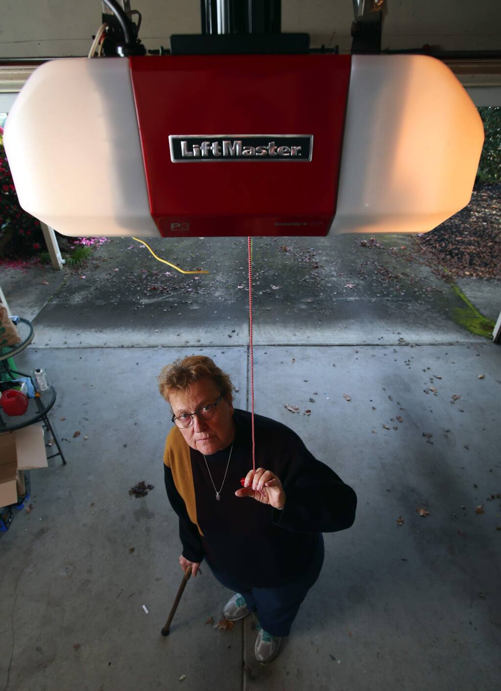 Oakmont resident Cheryl Diehm installed a backup battery to operate her garage door opener after she was unable to open her the door manually on the night of the fires. Diehm knew to pull the release latch but was unable to lift the heavy door when told to evacuate. (photo by John Burgess/The Press Democrat)