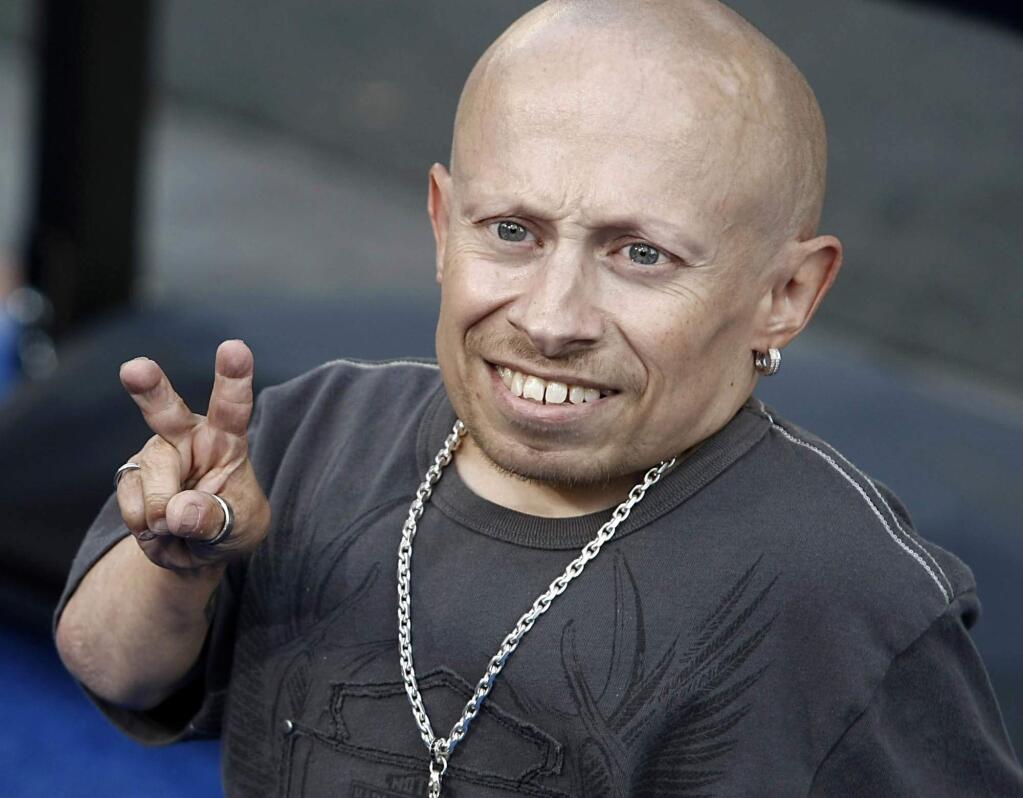 FILE- In this June 11, 2008 file photo, actor Verne Troyer poses on the press line at the premiere of the feature film 'The Love Guru' in Los Angeles. Troyer from the “Austin Powers” movie franchise has died. A statement provided by Troyer's representatives that was also posted to his Instagram and Facebook accounts says the 49-year-old actor died Saturday, April 21, 2018. No cause or place of death was given, but the statement discusses depression and suicide, and Troyer had publicly discussed struggling with alcohol addiction. He lived in Los Angeles. (AP Photo/Dan Steinberg, file)
