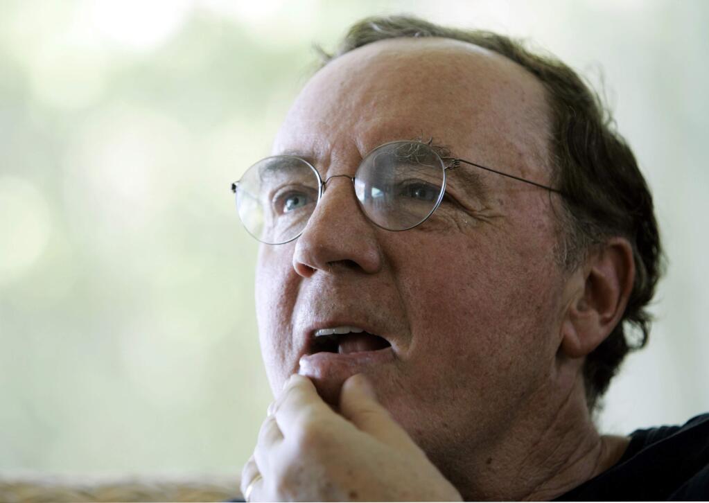 FILE - In this May 3, 2006, file photo, author James Patterson contemplates a question during an interview at his home overlooking the Intracoastal Waterway in Palm Beach, Fla. Little Brown & Company announced Friday, May 29, 2015, that Patterson has launched the jimmy patterson imprint for childrens books. The imprint will feature books by Patterson, who has written numerous childrens stories, and by other authors. (AP Photo/Wilfredo Lee, File)