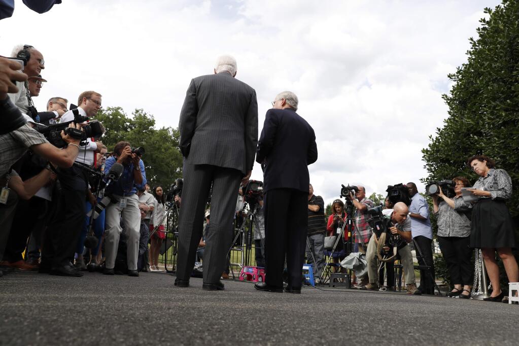 Senate Majority Whip Sen. John Cornyn, R-Texas, left, Senate Majority Leader Mitch McConnell of Ky., speak with the media after they and other Senate Republicans had a meeting with President Donald Trump at the White House, Tuesday, June 27, 2017, in Washington. (AP Photo/Alex Brandon)