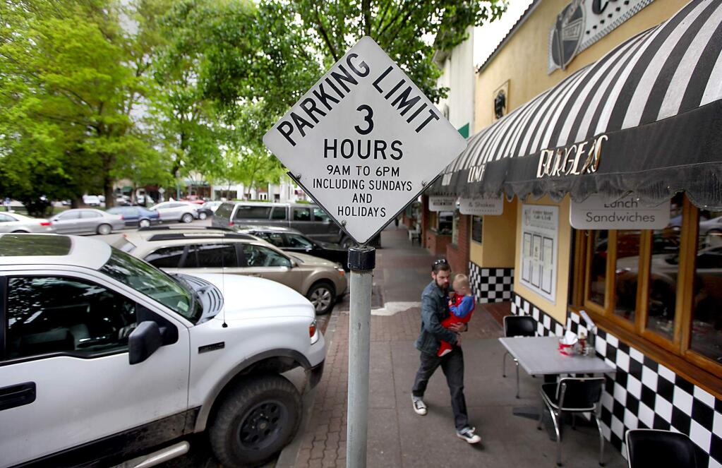 The Healdsburg City Council has agreed to look into charging for some downtown parking spots. (KENT PORTER/ PD FILE, 2012)