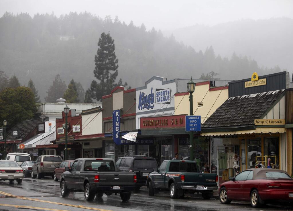 03/28/2011: A1: PC: Cars drive through downtown Guerneville on Sunday, March 27, 2011, in (BETH SCHLANKER/ The Press Democrat)
