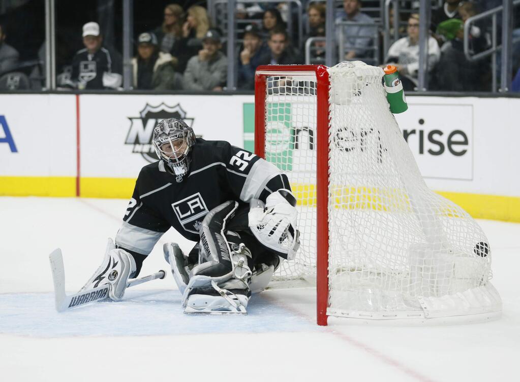 A shot by San Jose Sharks right wing Joel Ward gets past Los Angeles Kings goalie Jonathan Quick during the third period of an NHL hockey game, Sunday, Nov. 12, 2017, in Los Angeles. The Sharks won, 2-1. (AP Photo/Danny Moloshok)