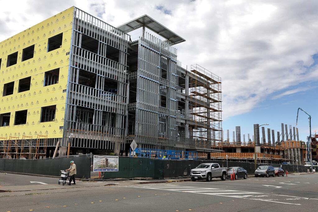 Construction continues on the new Santa Rosa Memorial Hospital medical office building and adjacent garage in Santa Rosa on Friday, August 9, 2019. (Christopher Chung/ The Press Democrat)