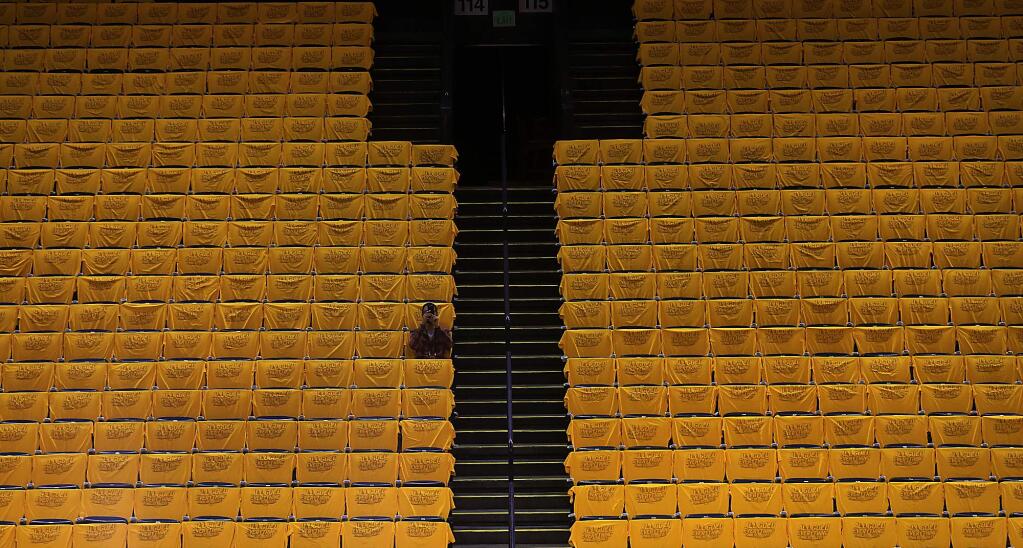 T-shirts are draped over every seat in Oracle Arena, Sunday June 4, 2017 prior to the Warriors to game 2 of the NBA Finals against the Cleveland Cavaliers. (Kent Porter / The Press Democrat) 2017