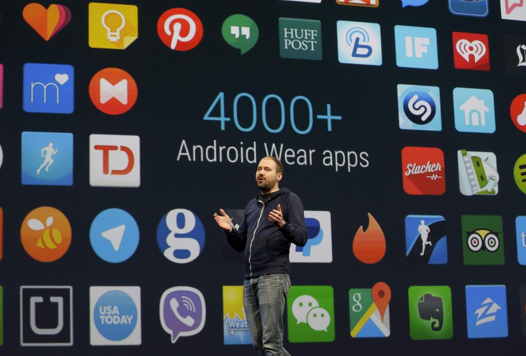 David Singleton, director at Android Wear, speaks during the Google I/O 2015 keynote presentation in San Francisco, Thursday, May 28, 2015. (AP Photo/Jeff Chiu)