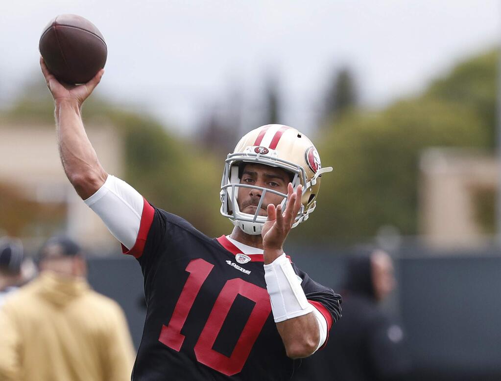 San Francisco 49ers quarterback Jimmy Garoppolo throws a pass during the team's practice in Santa Clara, Tuesday, May 21, 2019. (AP Photo/Josie Lepe)