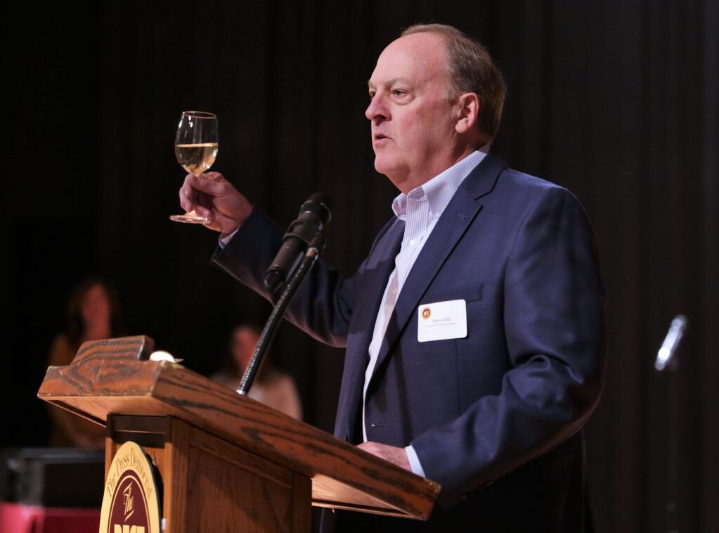 Press Democrat publisher and Sonoma Media Investments CEO Steve Falk salutes the winners of the Best of Sonoma County readers’ poll. Sonoma County businesses, venues, restaurants and hidden gems were recognized at the Best of Sonoma County Awards reception at the Friedman Event Center in Santa Rosa, Tuesday December 5, 2017. (Will Bucquoy/for The Press Democrat).