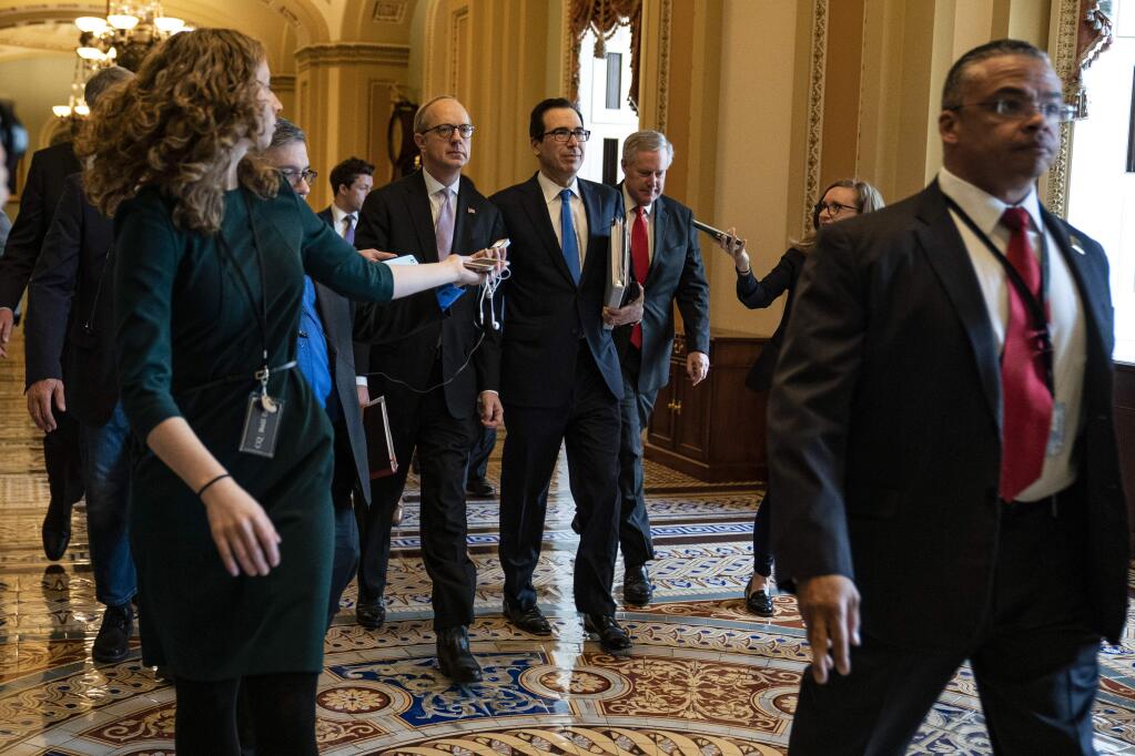 Treasury Secretary Steven Mnuchin on Capitol Hill on Tuesday, as Democrats and Republicans continued to negotiate details of an economic stimulus bill. (ANNA MONEYMAKER / New York Times)