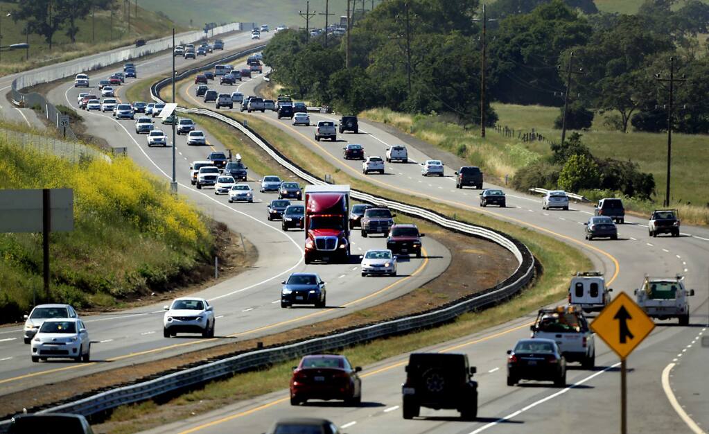 Heavy traffic flows in both the north and southbound directions of Highway 101 in the Marin-Sonoma Narrows, Monday, May 9, 2016, near the Marin-Sonoma County line. (Kent Porter / Press Democrat)