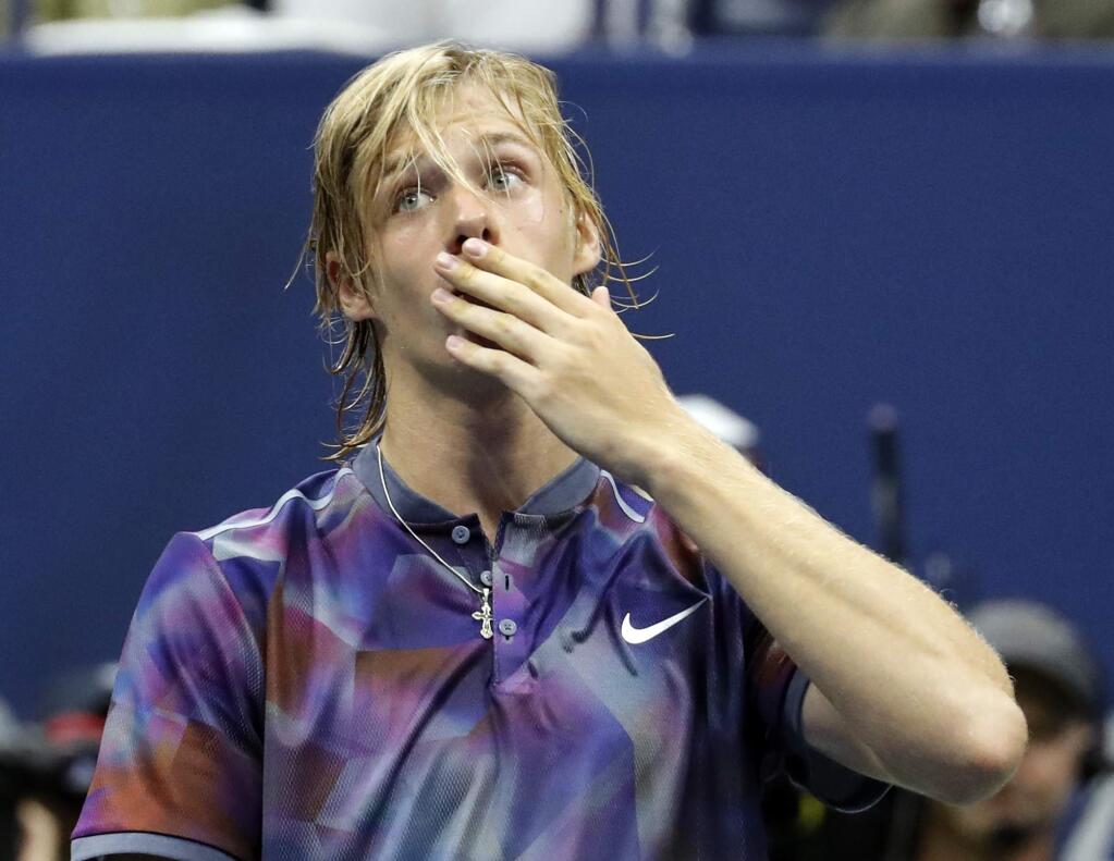 Denis Shapovalov, of Canada, salutes the crowd after loosing to Pablo Carreno Busta, of Spain, during the fourth round of the U.S. Open tennis tournament, Sunday, Sept. 3, 2017, in New York. (AP Photo/Julie Jacobson)