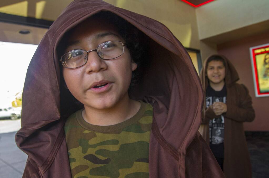 Xavier Donates is one of the students from Altimira teacher Bridget Paul's 'Jedi English' class, who took in a private viewing of 'Rogue One: A Star Wars Story' on Friday, December 16. Adding to the spirit of the day, most of the students attended the movie in Jedi robes (Photo by Robbi Pengelly/Index-Tribune)