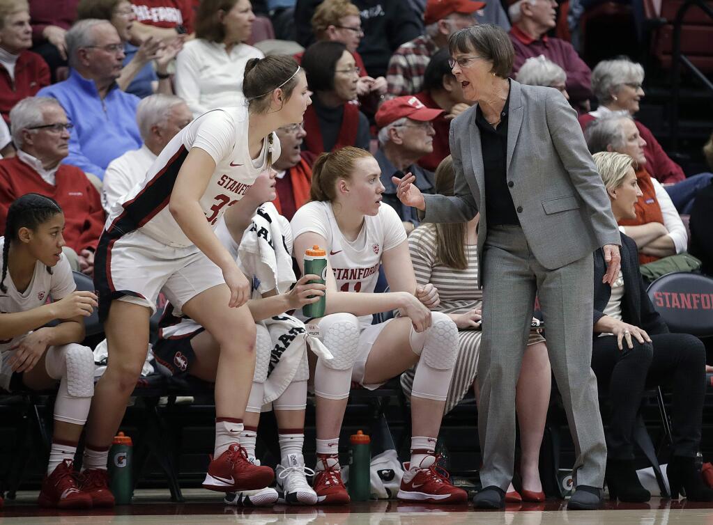 Stanford coach Tara VanDerveer, right, calls guard Hannah Jump (33) into the game during the first half of an NCAA college basketball game against Tennessee Wednesday, Dec. 18, 2019, in Stanford, Calif. (AP Photo/Ben Margot)
