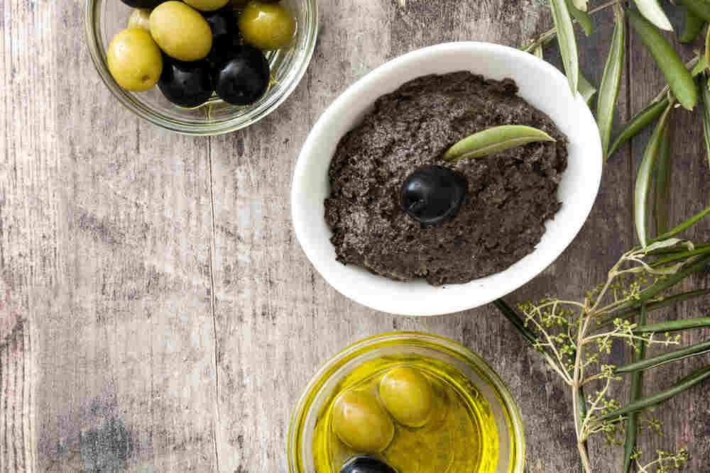 An olive paste first meshed in the south of France, the term 'tapenade' is derived from the Provencal word for capers, 'tapenas.'