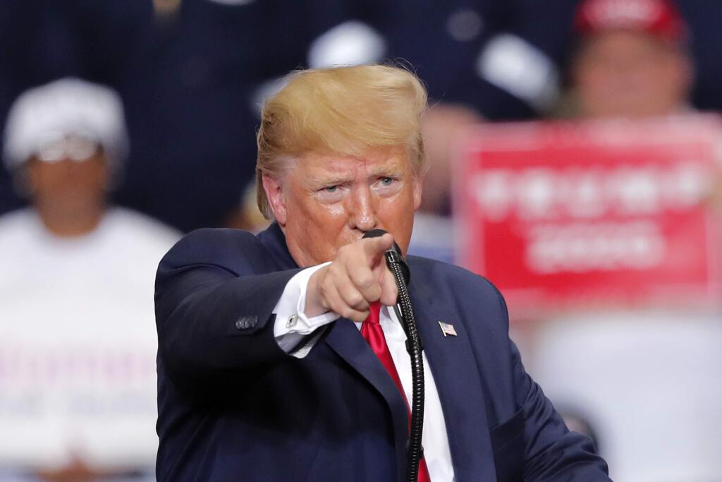 President Donald speaks at a campaign rally in Monroe, La., Wednesday, Nov. 6, 2019. . (AP Photo/Gerald Herbert)