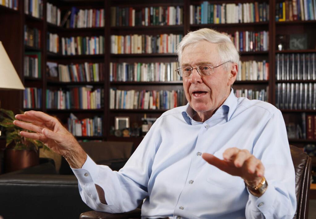 FILE - In this photo May 22, 2012 file photo, Charles Koch speaks in his office at Koch Industries in Wichita, Kansas. Billionaire industrialist and conservative benefactor Koch is hosting hundreds of the nation's most powerful political donors this weekend in Colorado. The exclusive gathering at the foot of the Rocky Mountains is open to donors who promise to give at least $100,000 each year to Koch-approved groups. The Koch network has avoided supporting Donald Trump's presidential campaign so far. (Bo Rader/The Wichita Eagle via AP, File)