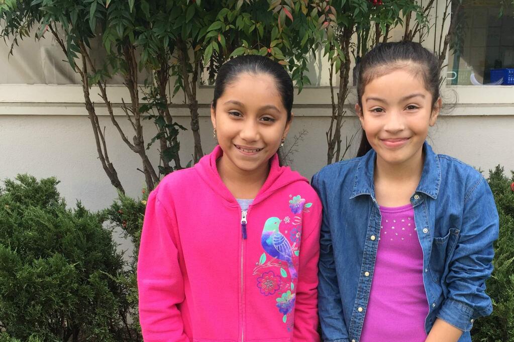 El Verano fifth graders Beatriz Lopez and Maribel Monroy-Saldivar.