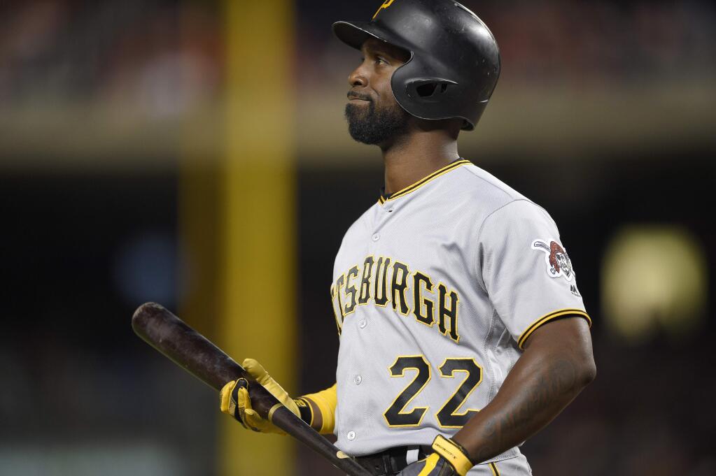 Pittsburgh Pirates' Andrew McCutchen looks on during a baseball game against the Washington Nationals, Friday, Sept. 29, 2017, in Washington. (AP Photo/Nick Wass)