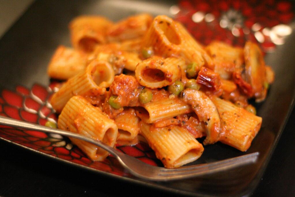 Jessie FetterlingSpicy tomato cream sauce pasta is vegetarian and can be adjusted based on veggie preferences.