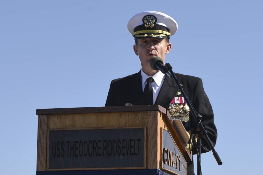 Capt. Brett Crozier addresses the crew for the first time as commanding officer of the aircraft carrier USS Theodore Roosevelt (CVN 71) during a change of command ceremony on the ship's flight deck on Nov. 1, 2019. Crozier relieved Capt. Carlos Sardiello to become the 16th commanding officer of Theodore Roosevelt. (U.S. Navy photo by Mass Communication Specialist 3rd Class Sean Lynch/Released)