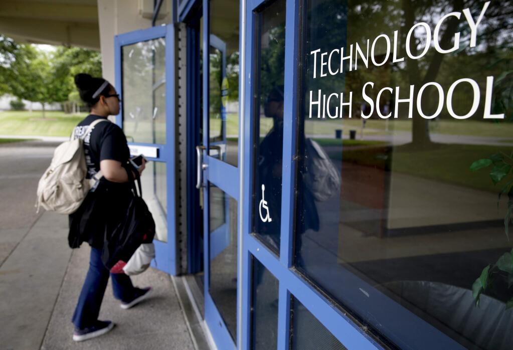 A student enters Technology High School. (BETH SCHLANKER/ PD FILE)