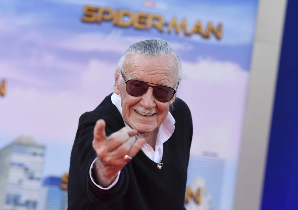 In this June 28, 2017 file photo, Stan Lee arrives at the Los Angeles premiere of 'Spider-Man: Homecoming' at the TCL Chinese Theatre. (Photo by Jordan Strauss/Invision/AP, File)