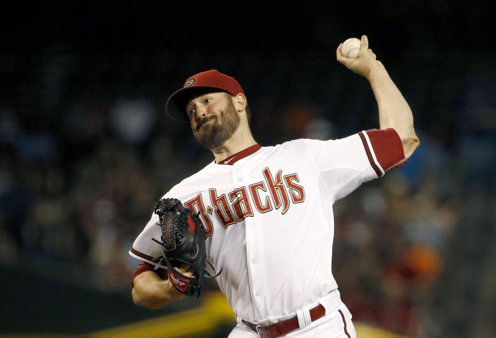 Arizona Diamondbacks' Robbie Ray throws a pitch against the San Francisco Giants during the first inning of a baseball game Friday, July 17, 2015, in Phoenix. (AP Photo/Ross D. Franklin)