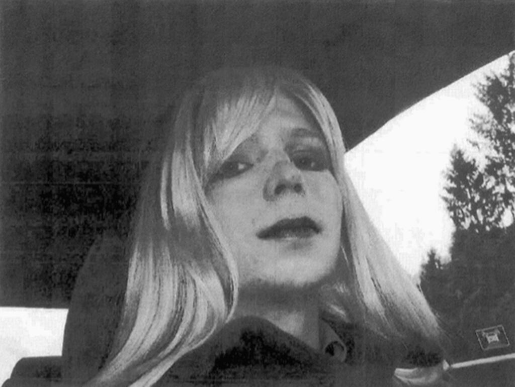 FILE - This undated file photo provided by the U.S. Army shows Pfc. Chelsea Manning wearing a wig and lipstick. (U.S. Army via AP, File)