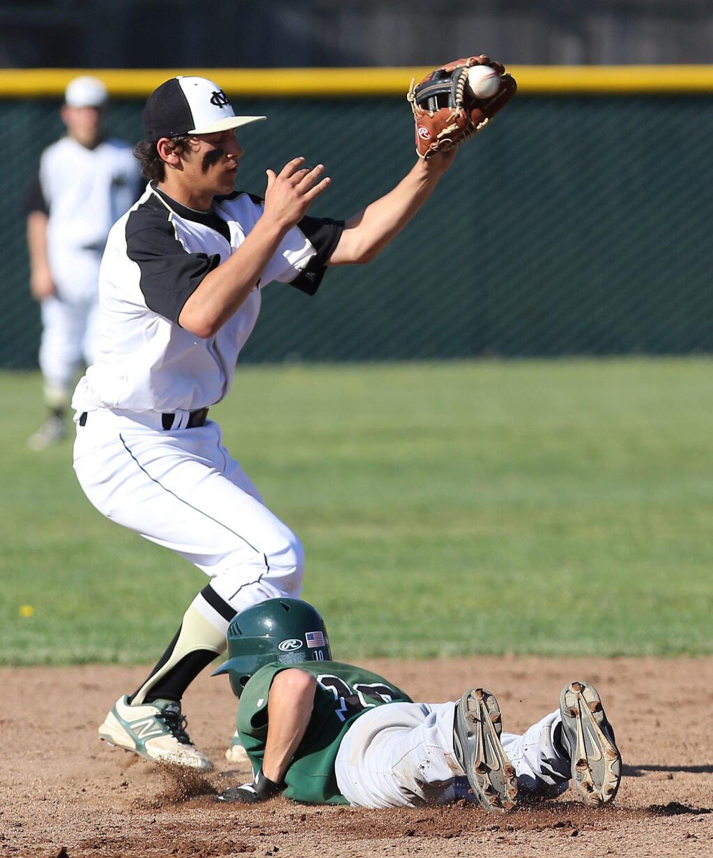 Maria Carrillo's Jake Scheiner tries to get Sonoma Valley's Jaxson Strong out at second during a 2013 game.