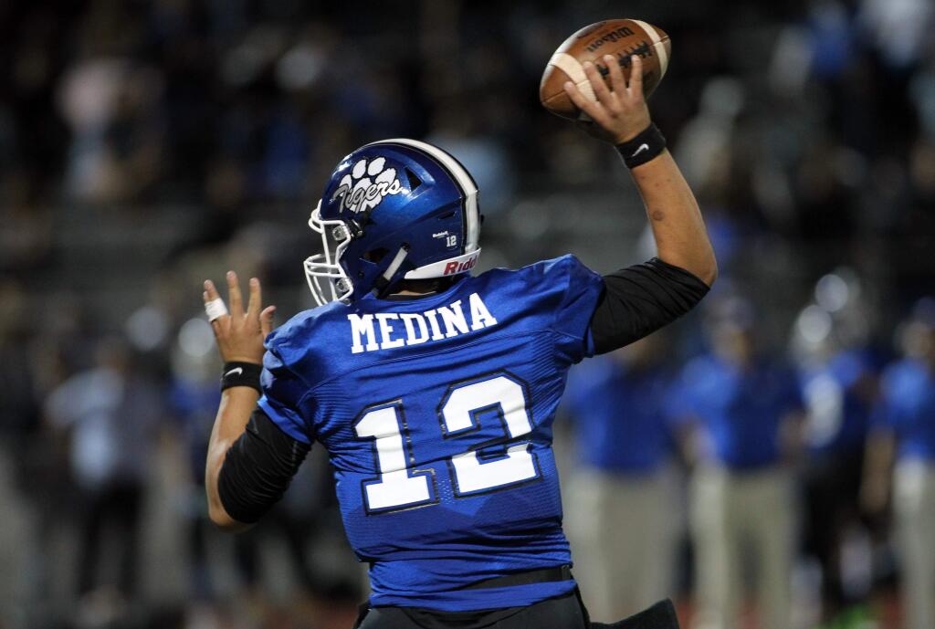 Analy High School's Brenden Medina throws a pass in the first half in Sebastopol on Friday, September 22, 2017. (Photo by Darryl Bush / For The Press Democrat)