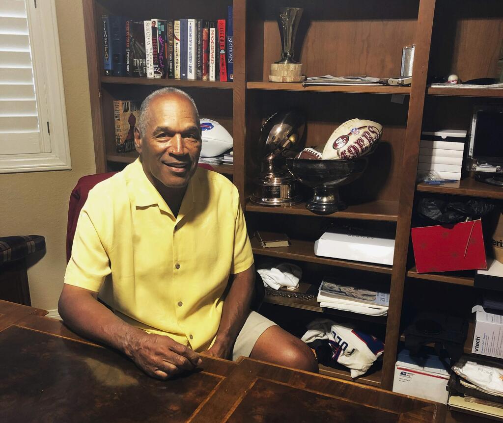 This Thursday, June 6, 2019, photo shows O.J. Simpson in his Las Vegas area home. After 25 years living under the shadow of one of the nation's most notorious murder cases, Simpson says his life now is fine. (AP Photo)
