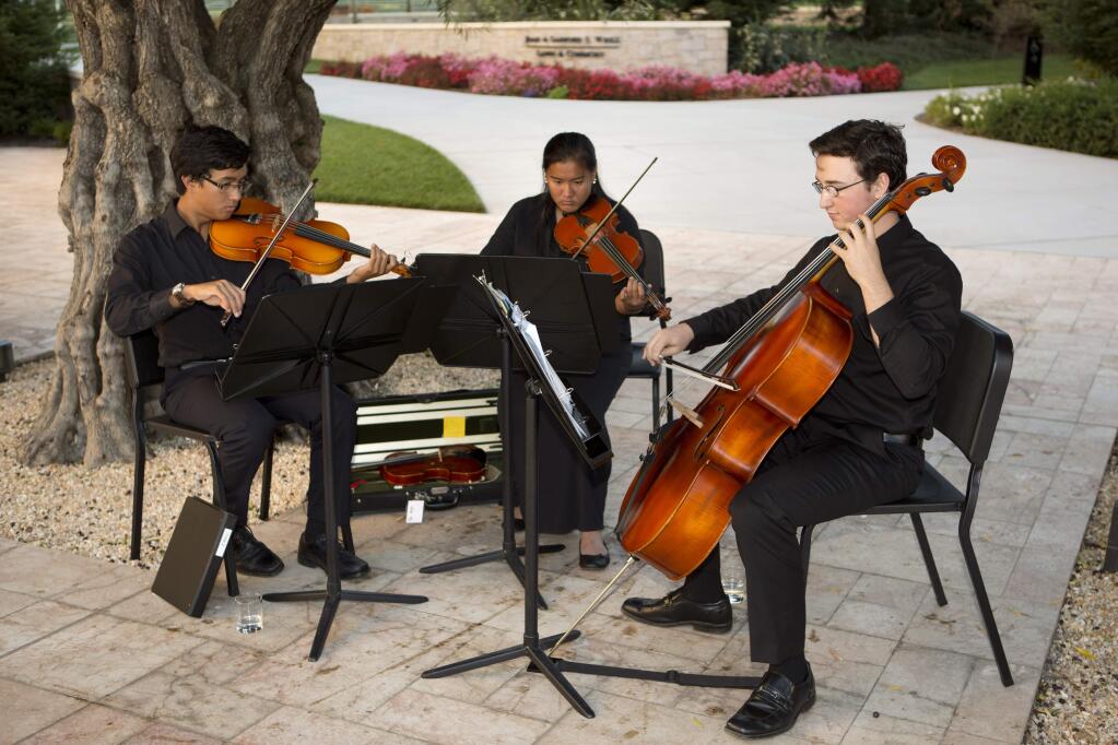 String musicians play for guests during the season opening gala of the Santa Rosa Symphony.