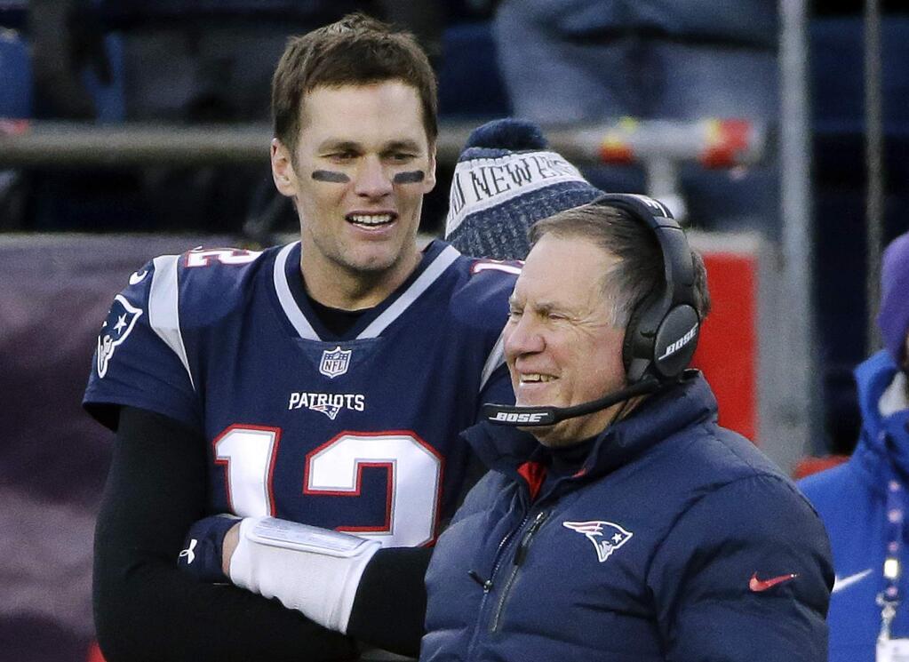 New England Patriots quarterback Tom Brady left and head coach Bill Belichick speak on the sideline during the fourth quarter against the New York Jets, Sunday, Dec. 30, 2018, in Foxborough, Mass. (AP Photo/Steven Senne)