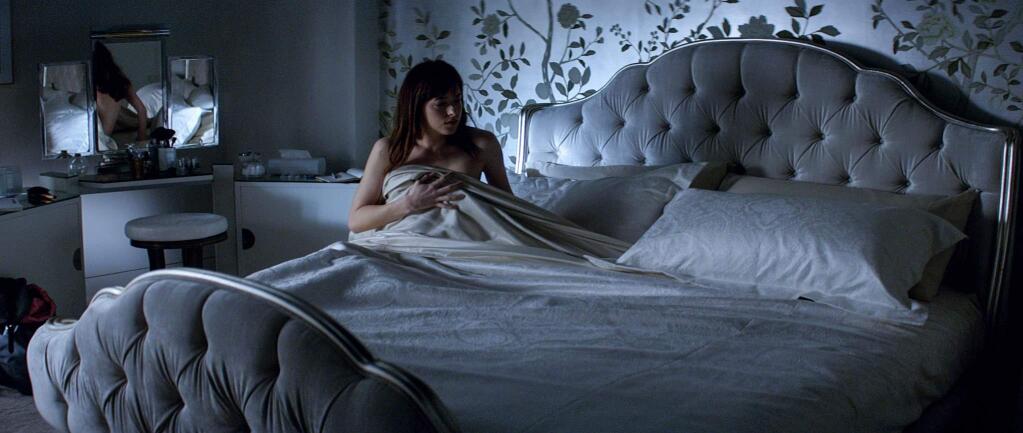 Dakota Johnson in a scene from 'Fifty Shades of Grey.' (Universal Pictures and Focus Features)
