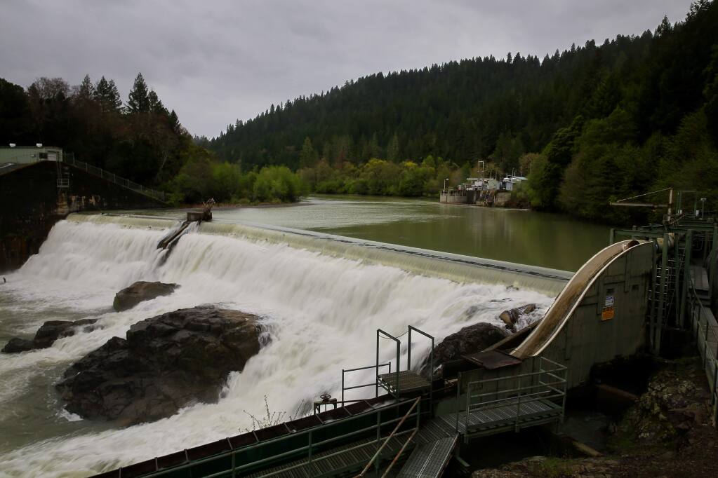 Water from the Eel River collects at Van Arsdale Reservoir and flows over Cape Horn Dam. A percentage of the water is redirected through a diversion tunnel to the Potter Valley Powerhouse and into the east fork of the Russian River. (Christopher Chung / The Press Democrat)