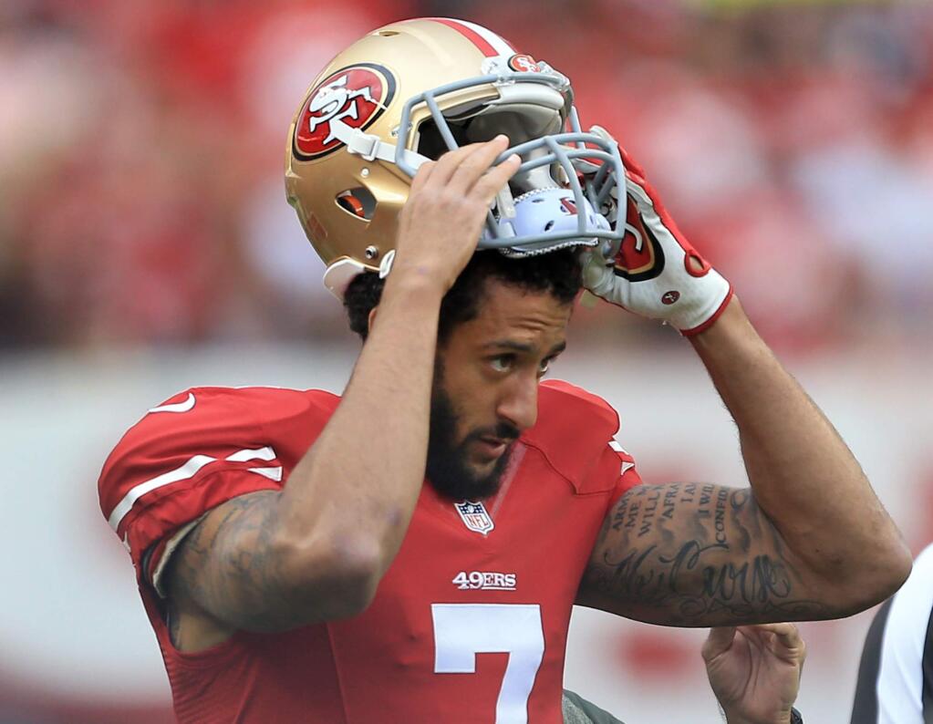 Colin Kaepernick has a 28-30 record as a starter and has completed 59.8 percent of his passes in his career. (Kent Porter / The Press Democrat) 2015