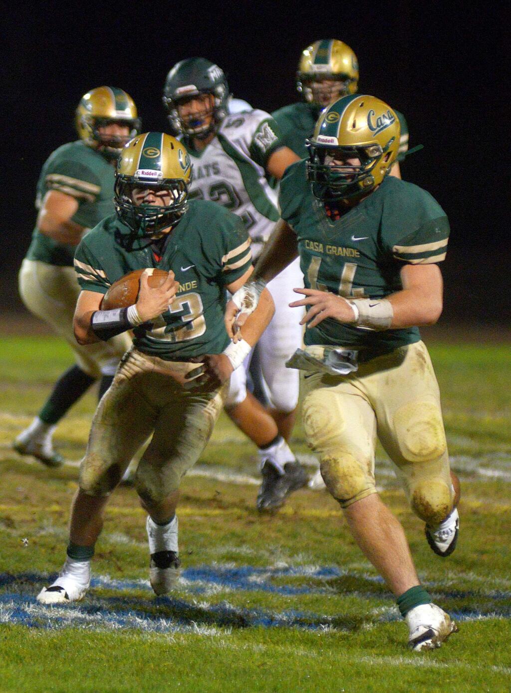 SUMNER FOWLER/FOR THE ARGUS-COURIERCasey Longaker (44) escorts Max Cerini (13) on his way to the end zone. Longaker and Cerini were among five Gauchos to score touchdowns in Casa's 48-6 win over Miramonte.