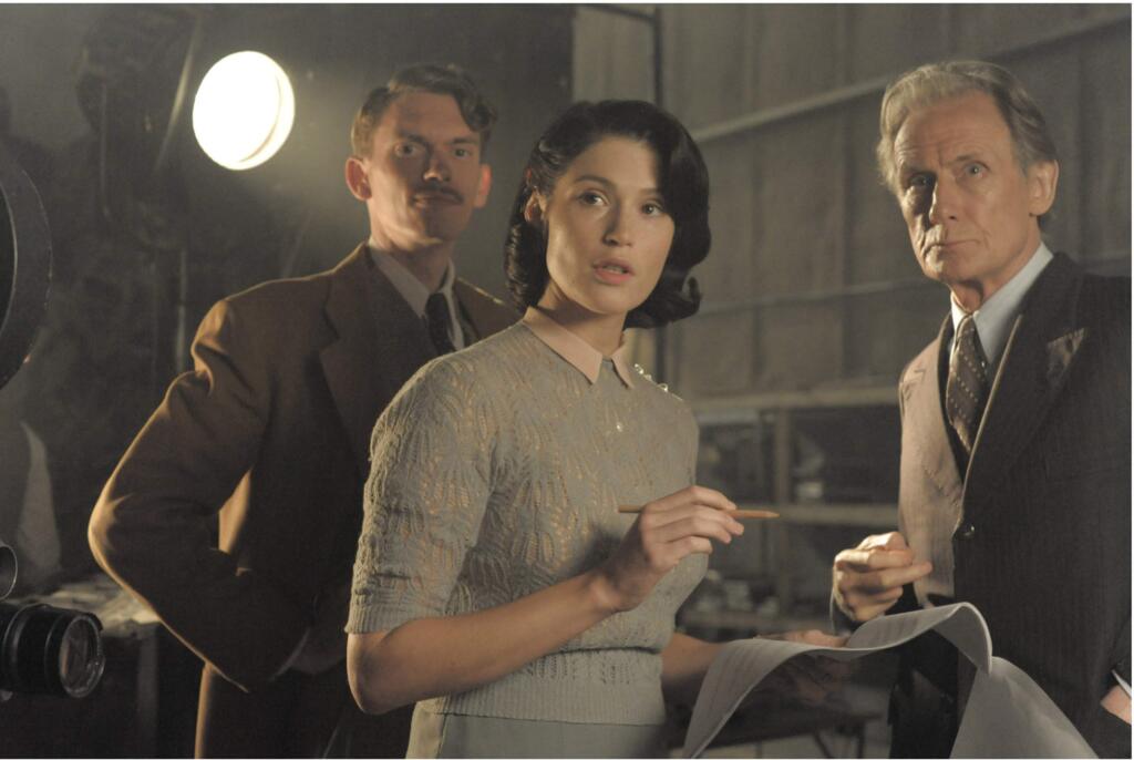 STX EntertainmentGemma Arterton as Catrin Cole, with Bill Nighy, right, as Ambrose Hilliard and Sam Claflin as Tom Buckley in 'Their Finest.'