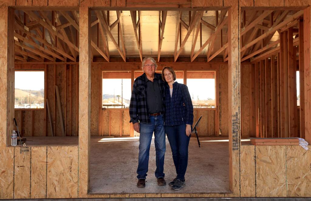 Richard and Renee Cheal in their home being rebuilt in Larkfield after the Tubbs fire burned the old one in 2017. (Kent Porter / The Press Democrat) 2018