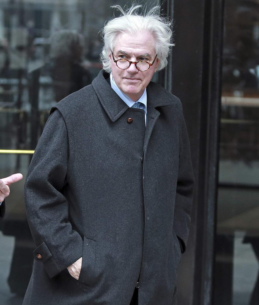 Gregory Abbott, the founder and chairman of International Dispensing Corp. leaves the federal courthouse after a hearing associated with the college admissions bribery scandal, Friday, March 29, 2019 in Boston. (Matt Stone/The Boston Herald via AP)