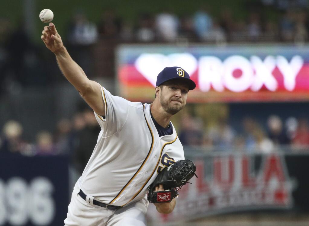 San Diego Padres starting pitcher Colin Rea throws against the San Francisco Giants during the first inning of a baseball game Tuesday, May 17, 2016, in San Diego. (AP Photo/Lenny Ignelzi)